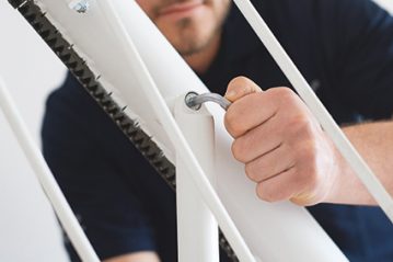Modern Mobility engineer fixing a Handicare Stairlift